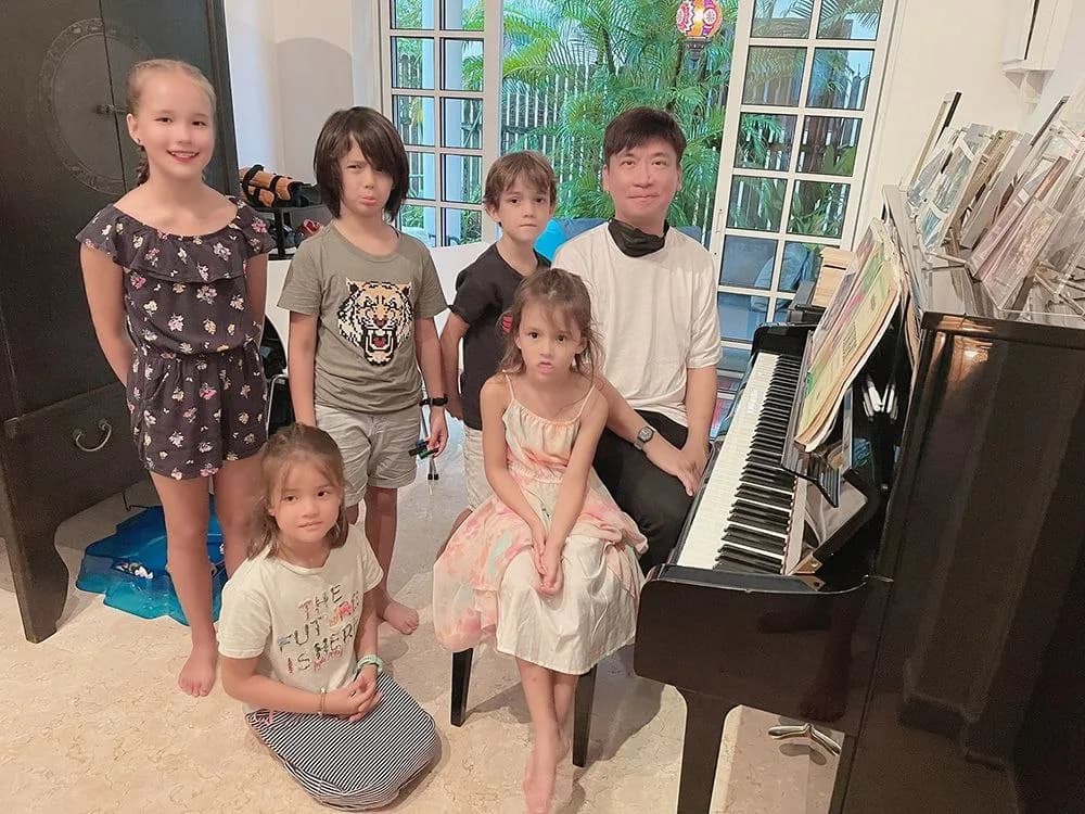 Victor guiding a student in a studio